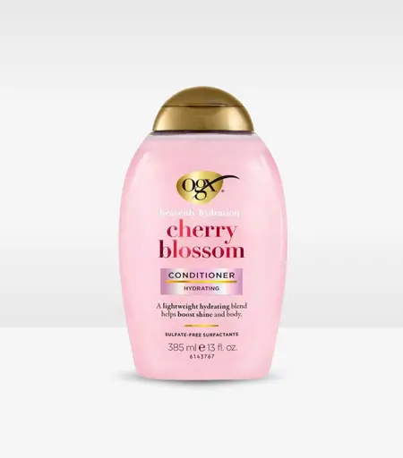 OGX Heavenly Hydration Cherry Blossom Conditioner 385ml bottle with cherry blossom flowers