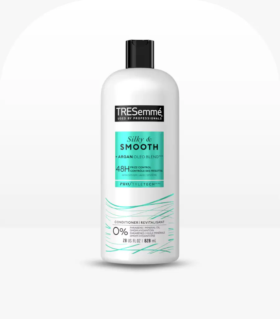 Tresemme Silky and Smooth Conditioner 828ml bottle with Argan Oil for frizz-free hair care